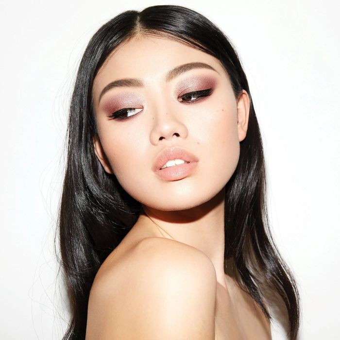 Model showcasing an eye makeup look created with shades from the Urban Decay Naked 3 palette.