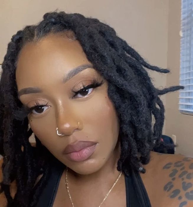 a person showcasing the powder's flawless application