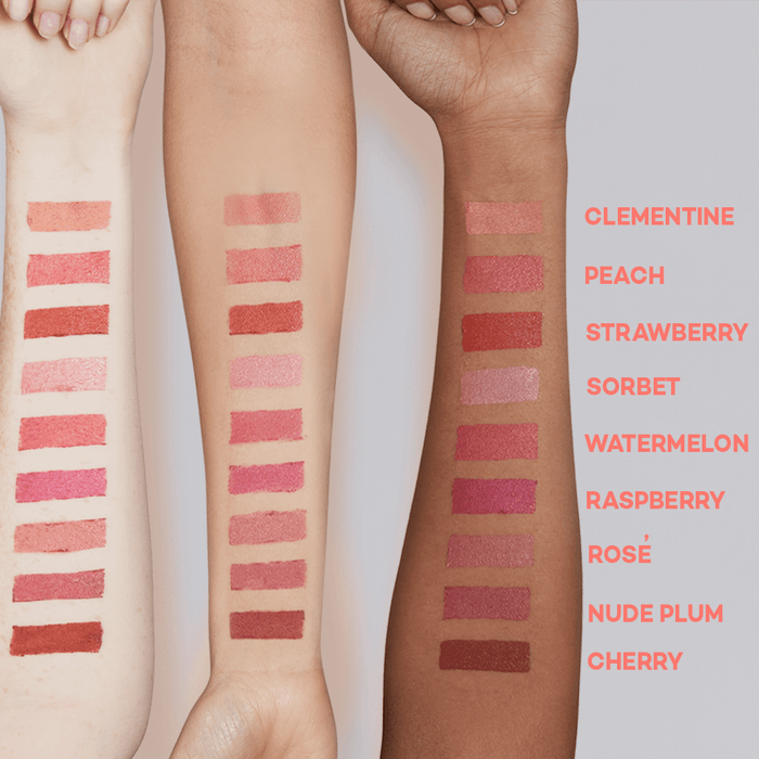 three arms with diverse skin tones displaying swatches of all nine shades of the lid-to-lip balmie