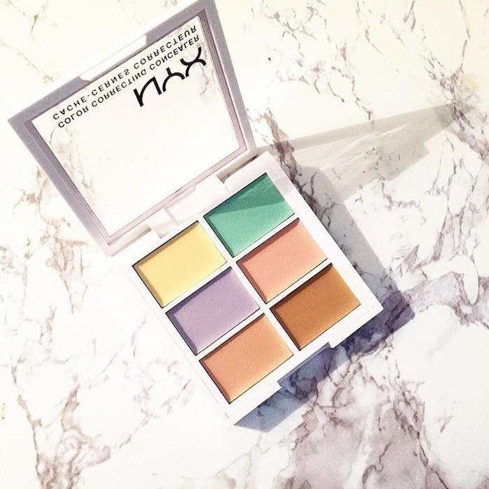 The palette featuring yellow, green, purple, peach, pink, and brown color correctors