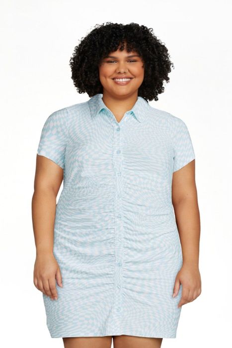 The model is dressed in the blue clash dress, highlighting its vibrant and striking design.