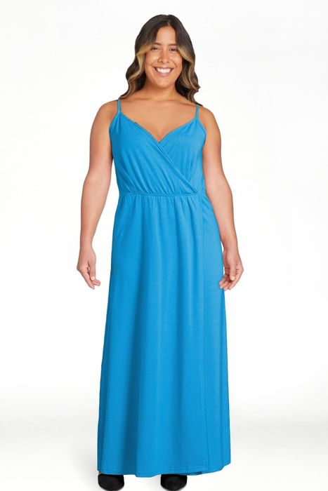 A model showcasing the teal dress, exuding elegance and a vibrant pop of color.