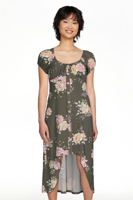 The model is showcasing the green midnight dress, highlighting its elegant and captivating design.