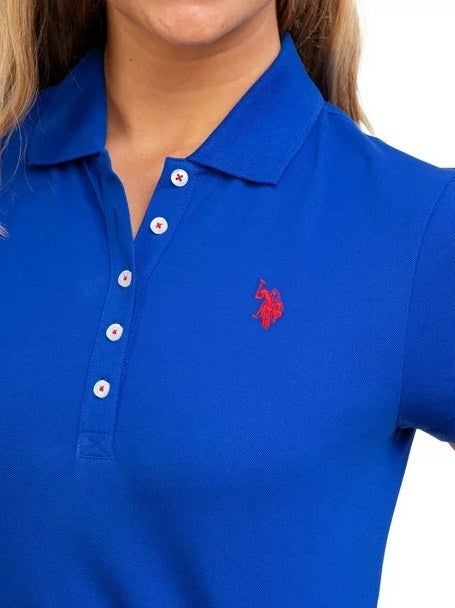 A detailed close-up of a model wearing the stylish blue raft dress, highlighting its design and fit.