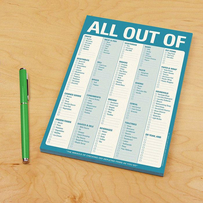 The blue notepad features sections for food categories, suggested items, and blank lines for personalized additions