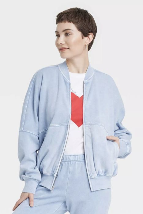 A person sporting the jacket in a cool shade of blue