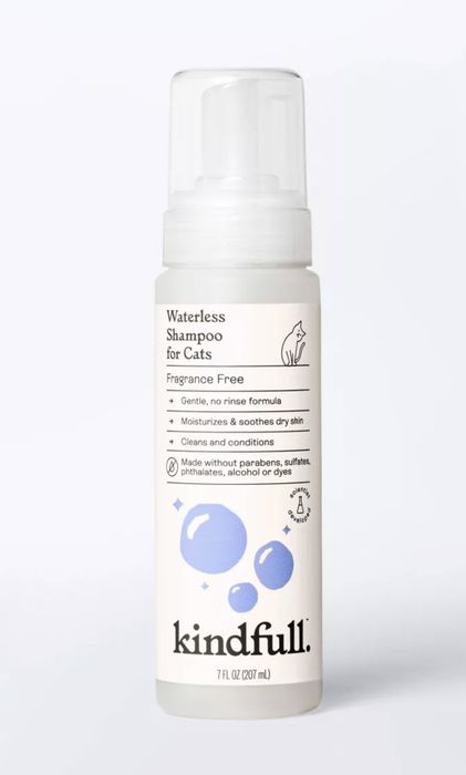 The bottle of the waterless shampoo product.