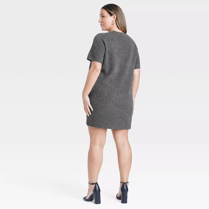A model wears a gray short-sleeve dress paired with ankle-strap heels, standing with her back to the camera. This image is tailored for a shopping-focused article.