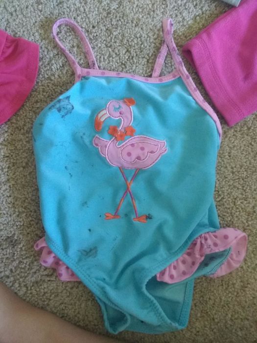A photo shared by a reviewer displaying a swimsuit with stubborn stains.