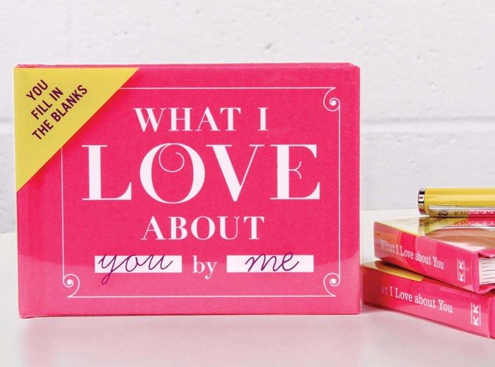 a charming little pink book titled "What I Love About You by Me"