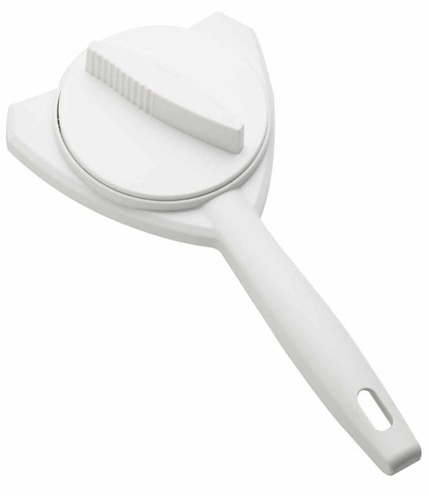 The round grip and handle of the white plastic jar opener
