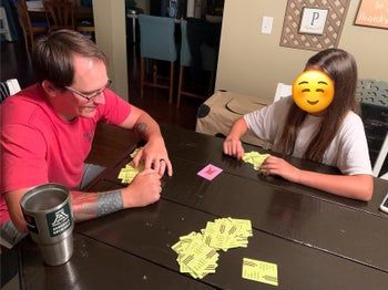a reviewer enjoying a lively game session with their child