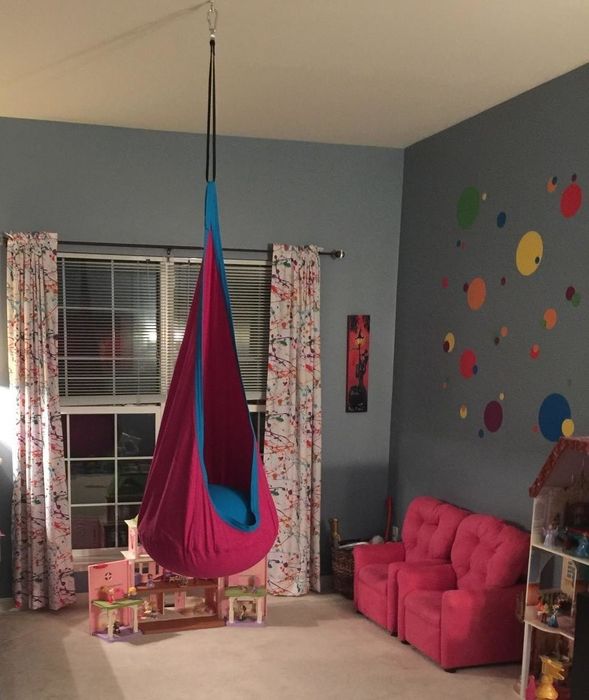 A photo showing a swing hanging indoors, shared by the reviewer.