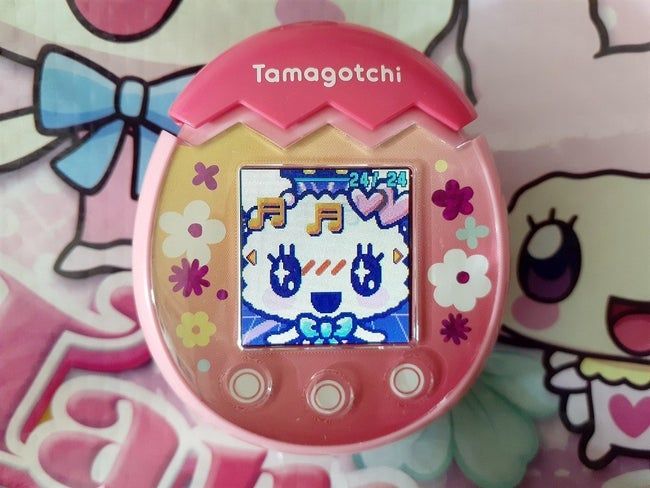the pink Tamagotchi device
