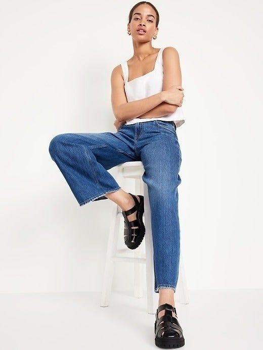 Model showcasing the black chunky sandals.