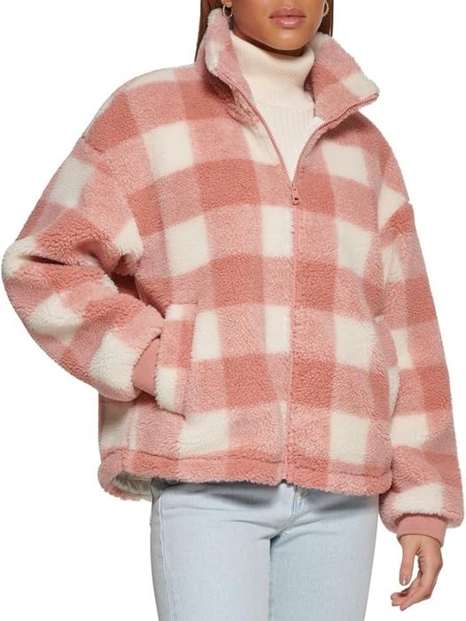 model showcasing a pink plaid jacket from the front