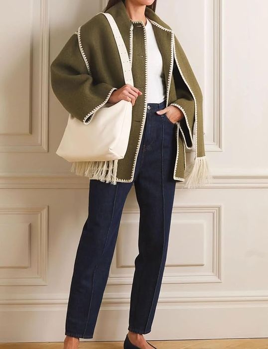 model wearing the green coat