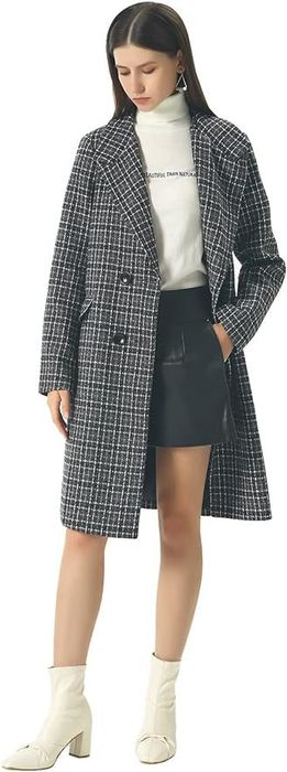 model wearing the coat in a sleek gray tone