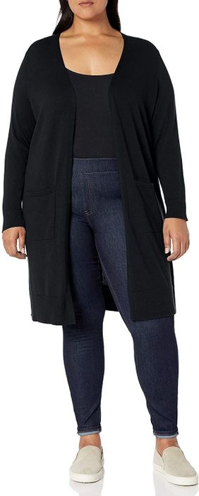 A model showcasing a black cardigan.