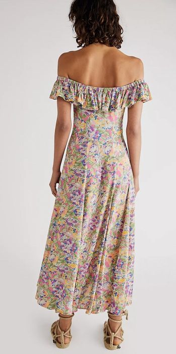 A back view of the dress showcasing the intricate floral print.