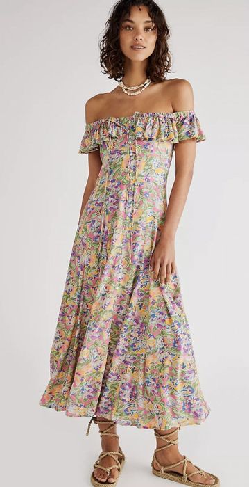 A front-facing view of the dress featuring a lovely floral pattern.