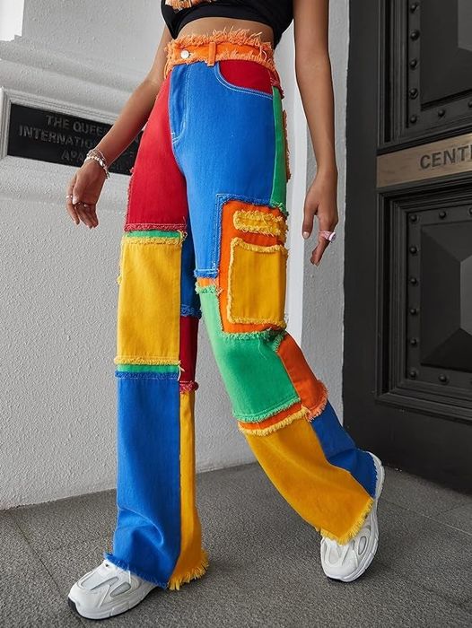 A model dressed in vibrant multicolored wide-leg pants