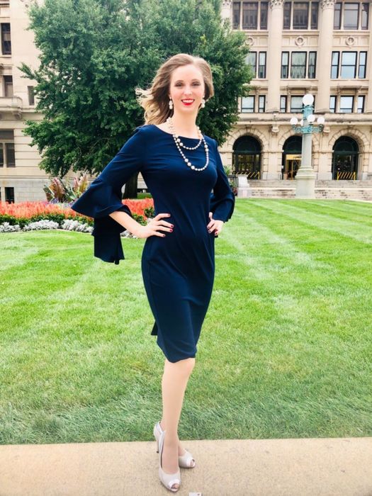 The dress is available in a stunning navy blue shade.
