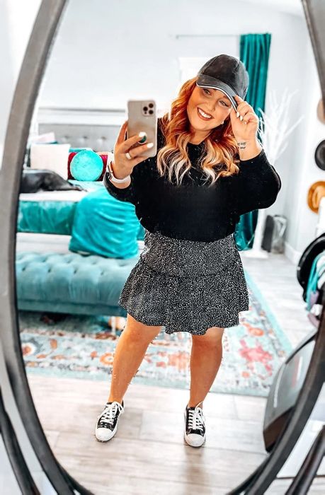 Another reviewer is wearing the same skirt, but in black.