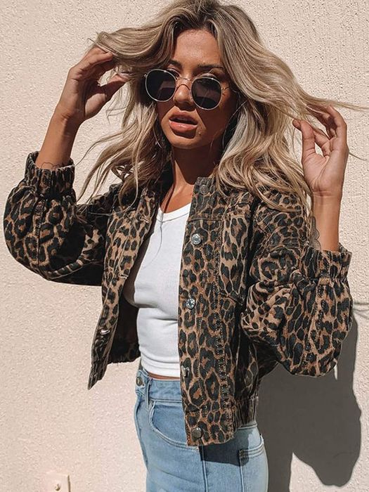 Model showcasing the leopard print jacket.