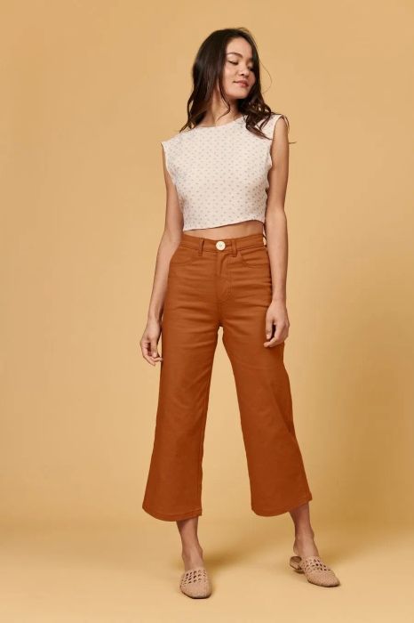 The pants in a warm rust shade.