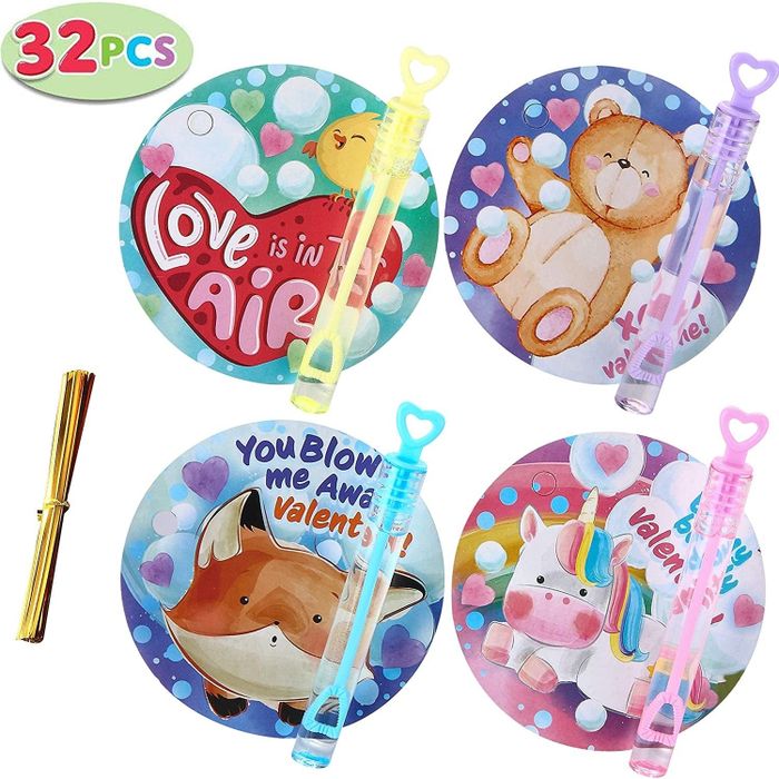 Four mini bubble wands attached to circular cards featuring various animal designs.
