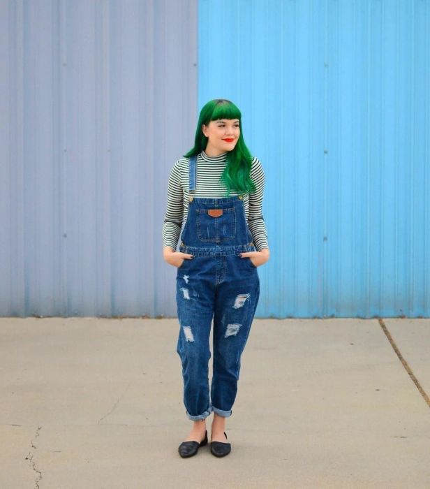 A reviewer pairs the overalls with a long-sleeve shirt.