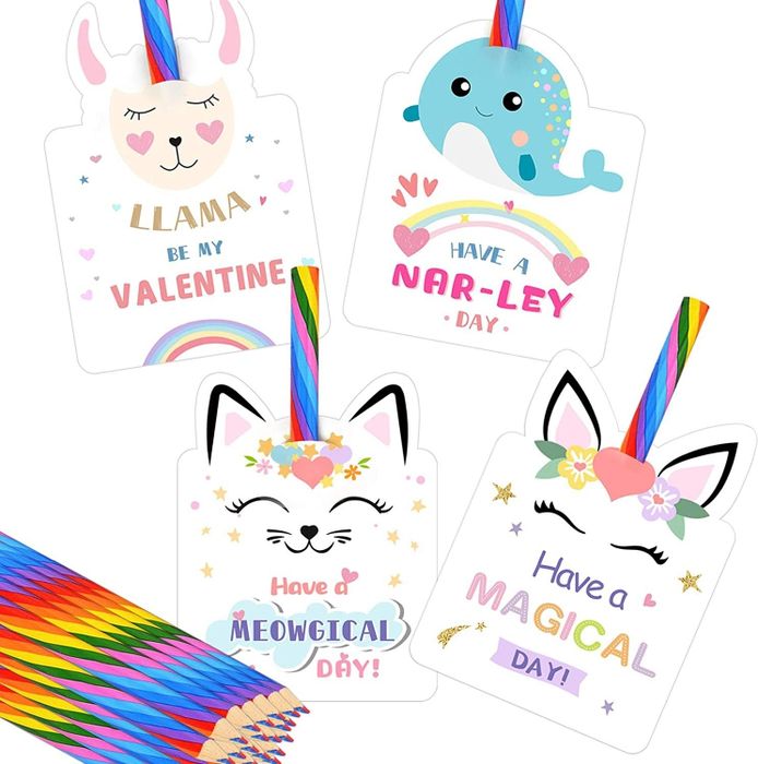Four whimsical unicorn-themed cards paired with rainbow-colored pencils.