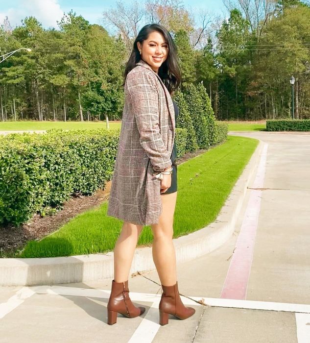 Reviewer sporting a brown plaid coat