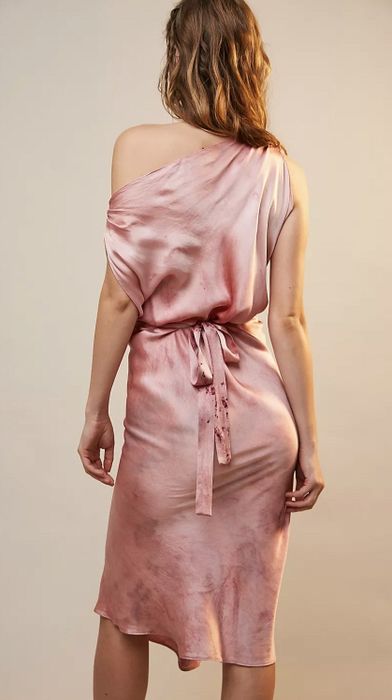 A back view of the dress in pink.