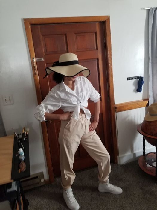 A reviewer rocking beige pants.