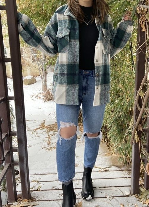 Reviewer wearing the green plaid version of the shacket.