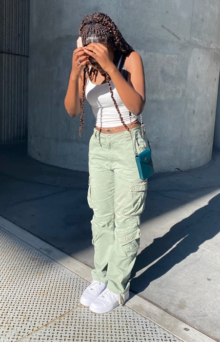 Another reviewer showcasing the olive green variant of the pants