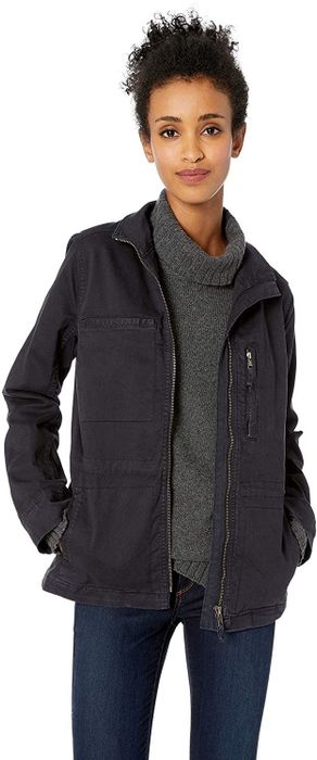Model wearing a black jacket