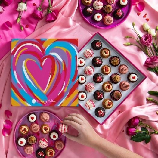 Valentine's Day-themed mini cupcakes in a beautiful box