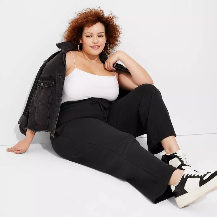 Model showcasing black sweatpants