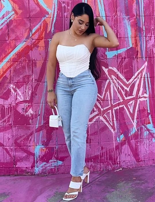 Another reviewer wearing the white bustier