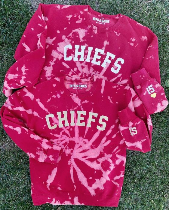 A red tie-dyed sweatshirt supporting the Chiefs.