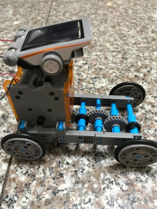 A reviewer’s photo showing a side view of a fully assembled robot.