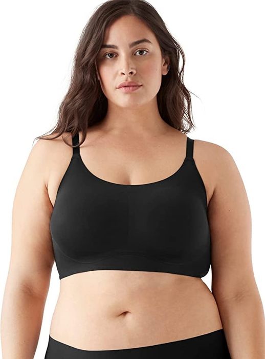 Model wearing the black seamless bra with thin straps