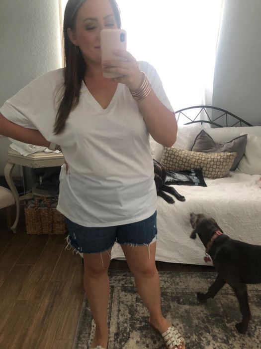A mirror selfie of a reviewer showcasing the t-shirt.