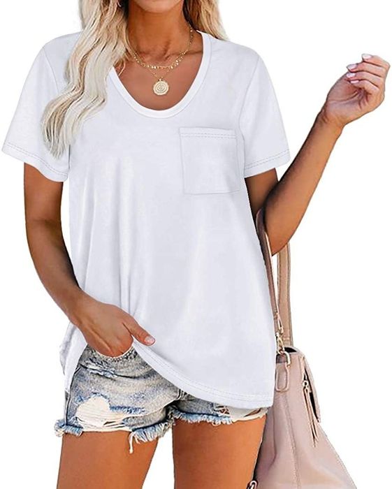 A model dressed in a white pocket T-shirt complemented by denim shorts.