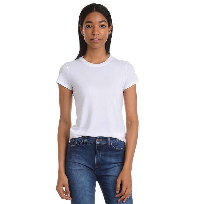 model dressed in a fitted crewneck white tee paired with jeans
