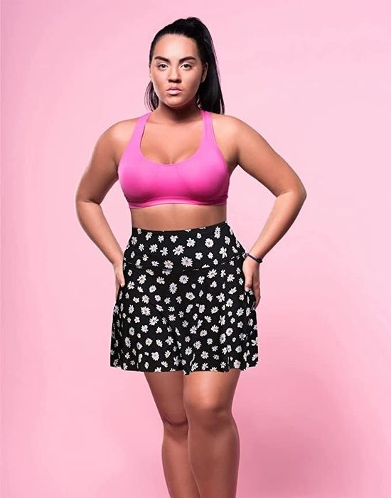 A model showcasing the daisy print skirt.