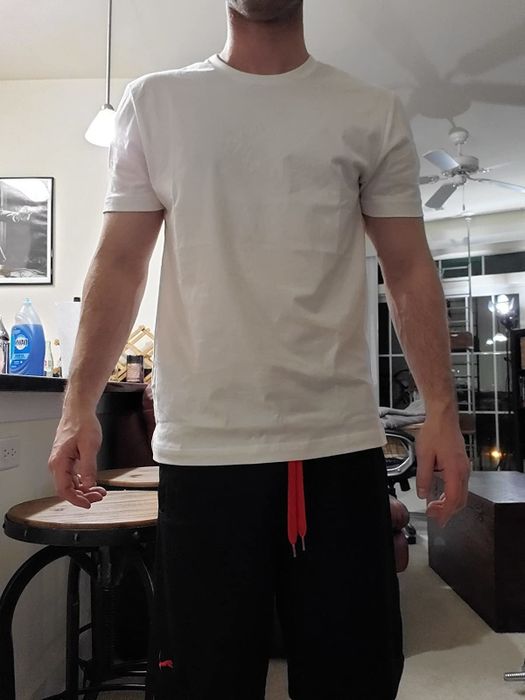 photo of the reviewer wearing a white tee